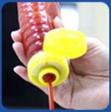 alt="Silicone valve cap with butterfly flip top for ketchup squeeze bottles"