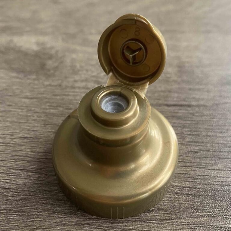 "38-400 flip top cap pokazujący zawias zatrzaskowy i plastikowy gwint butelki"