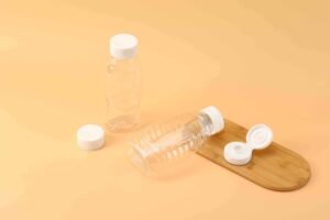 "plastic bottle flip top cap manufacturing"