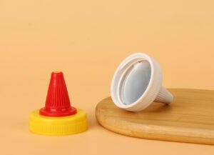 "plastic flip top caps with silicone valve for chili sauce bottles"