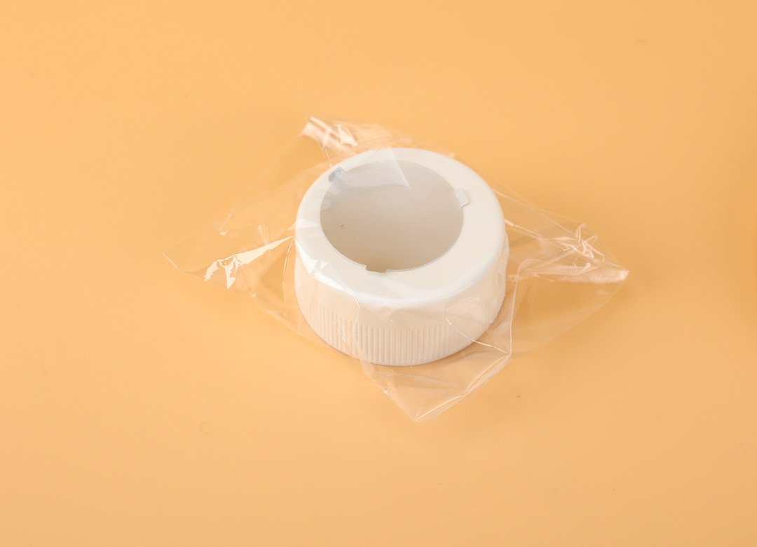 "다양한 색상의 플라스틱 플립 탑 캡 모음"