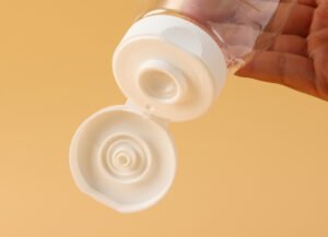 "Plastic flip top caps for bottles close-up view"