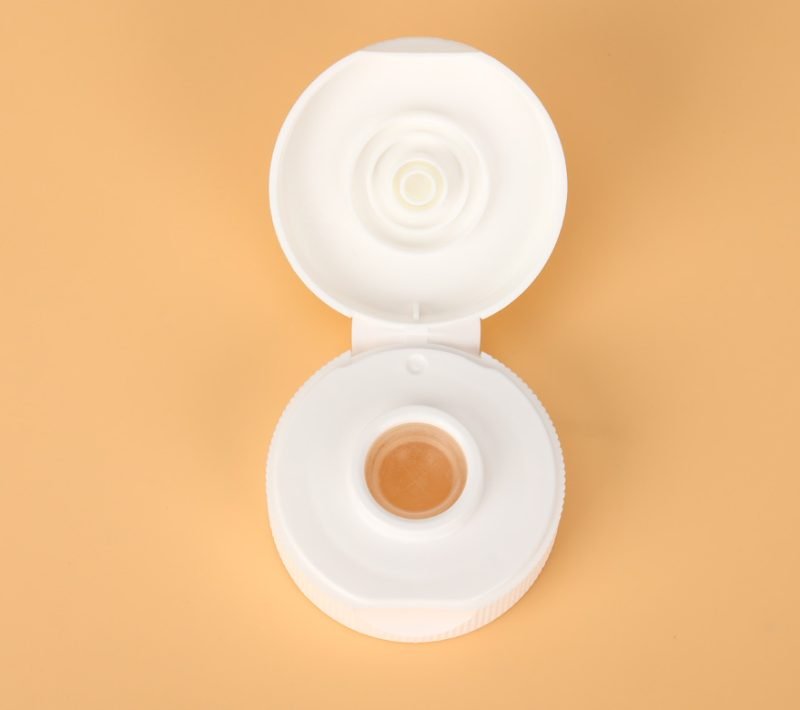 "plastic flip top caps for skincare lotion packaging"