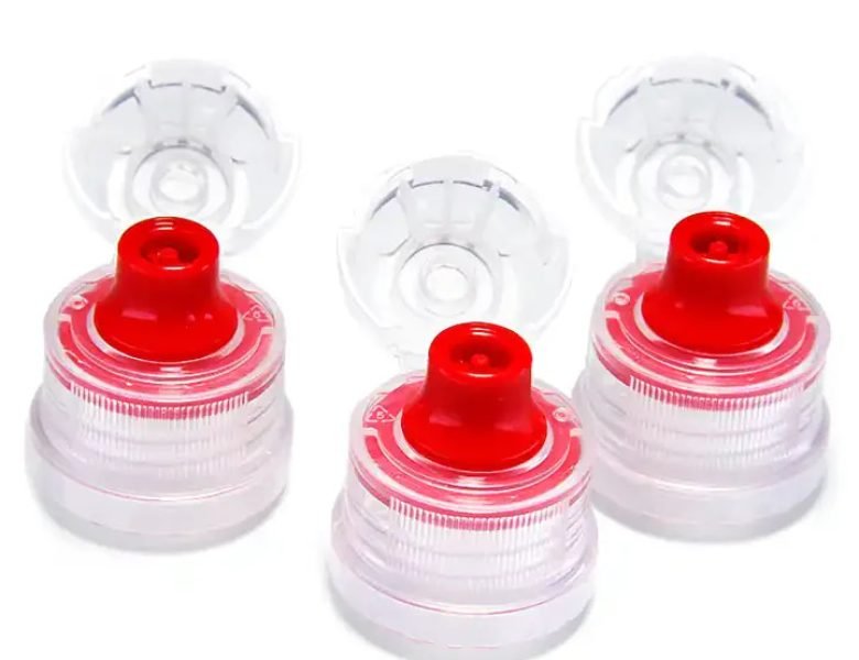 Bottled-water-with-sports-cap alt="Polypropylene bottle caps sports bar display"
