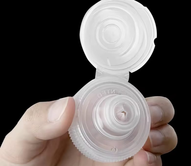 flip-top-cap-with-silicone-valve-01 Flip Top Cap with Silicone Valve for sauces, skincare, household, 28 400 bottle caps, cross-slit valve insert